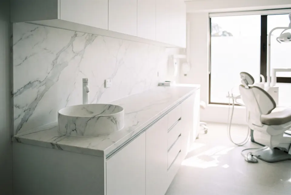 3D visualisation: veined solid surface worktop with vessel basin in a dental surgery